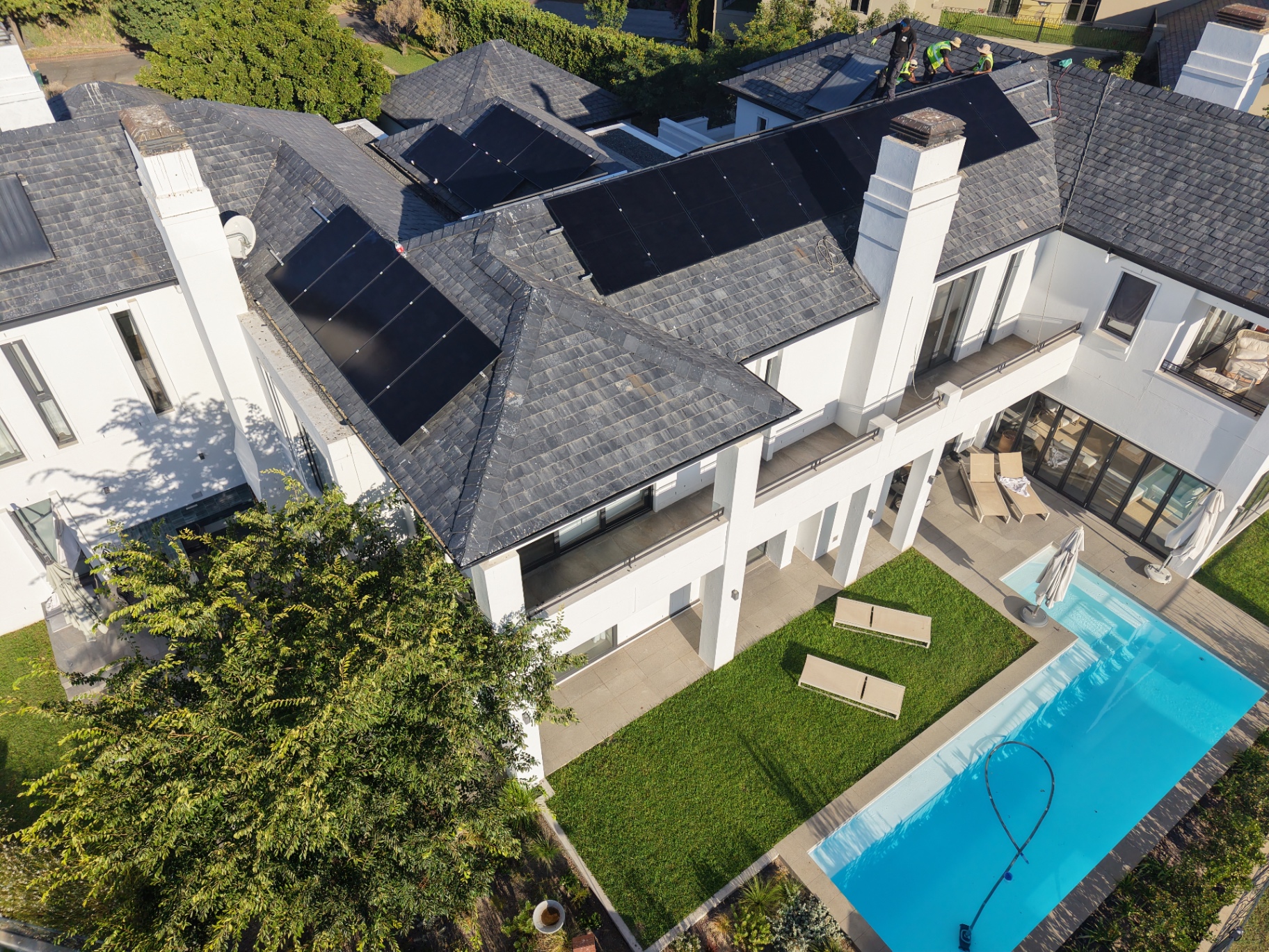 Aerial view of Aiko all-black panels on a slate roof at a Val de Vie Estate home